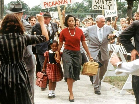 still-image--of-Ruby-Bridges-and-mother-walking-to-school-from-biopic-film.jpg