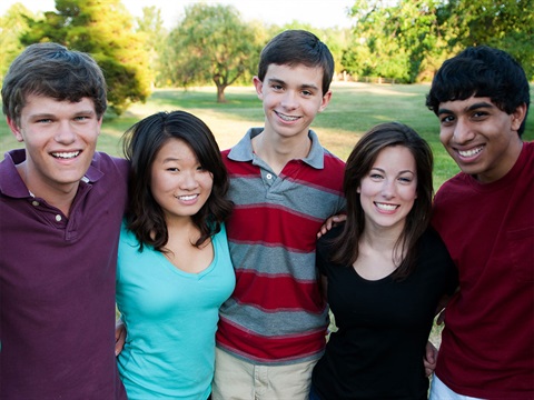 4-students-pose-for-photo-outdoors.jpg
