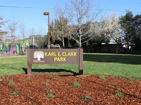 Karl-E-Clark-Park-sign-playground-grass-area