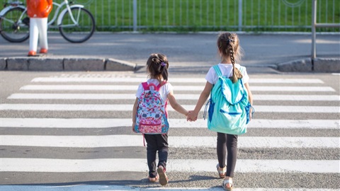 PublicInput--two girls walking in crosswalk to school.jpg