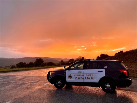police-suv-with-hills-and-sunset-in-background