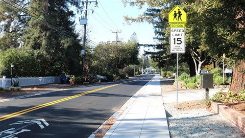 15-mph-school-zone-speed-sign-and-completed-Sharon-Road-sidewalk.jpg