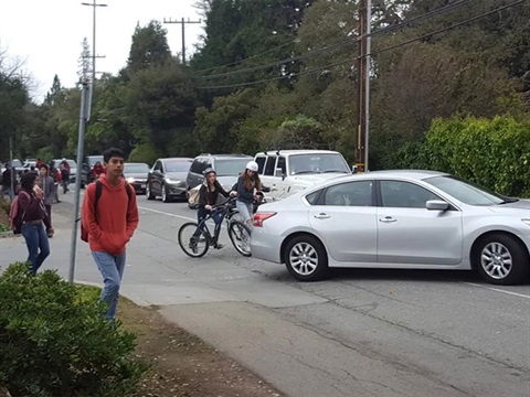 students-walk-to-school-in-traffic---cars,-pedestrians-and-bicycles-intersect-on-street-Coleman-and-Ringwood-Avenues.jpg