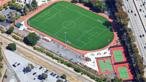 Aerial view of sports field and courts 