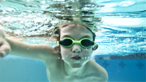 Boy swimming underwater