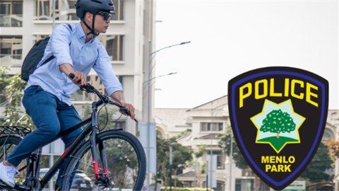 Man on bike with menlo park PD badge graphic