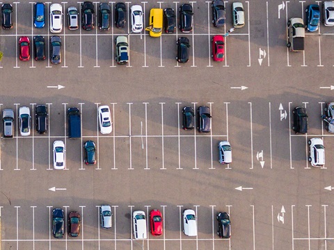 Aerial-of-large-mostly-empty-parking-lot.jpg