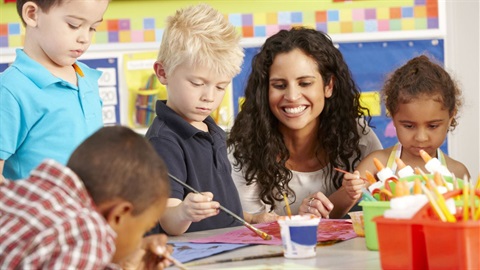 Children painting in classroom.jpg