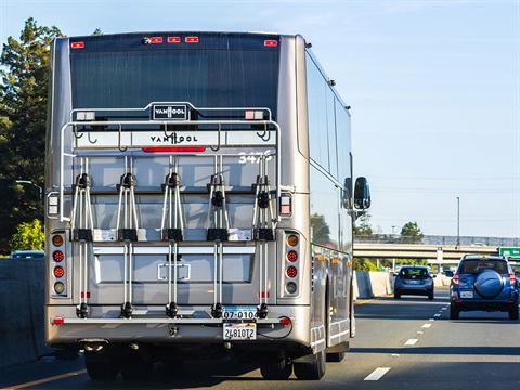 Facebook-commuter-shuttle-driving-on-the-carpool-lane-on-Bayshore-Freeway-Highway-101.jpg