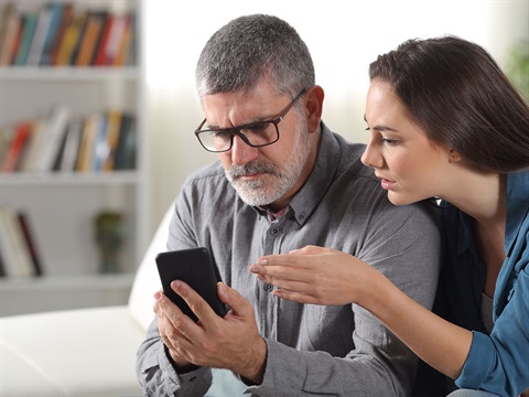 Father-and-daughter-on-smartphone.jpg