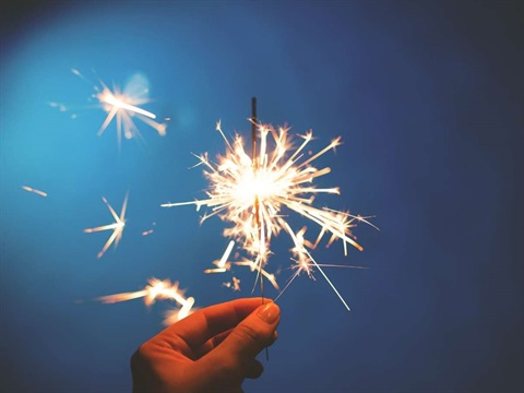 Hand holding an illegal safe and sane sparkler firework.jpg