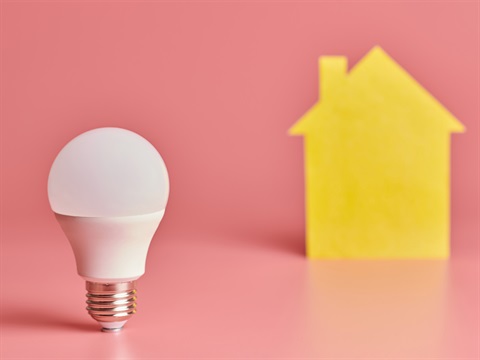 Home-electrification-concept-with-lightbulb-and-yellow-home-outline-on-pink-background.jpg