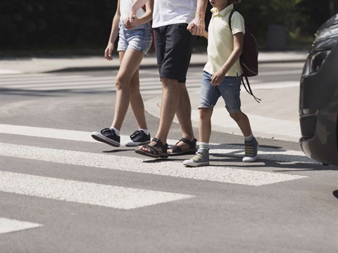 kids-crossing-street-while-holding-hands.jpg