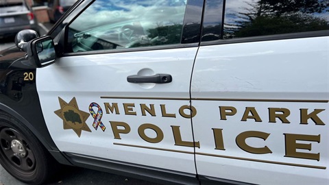 Menlo Park Police vehicle with autism ribbon.jpg