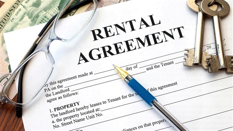 Rental agreement with pen and keys.jpg