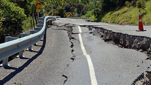 severe-earthquake-roadway-damage-cracks-and-orange-cones.jpg