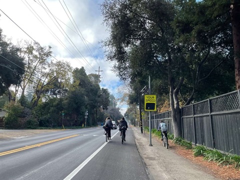 three people riding bikes on Ringwood.jpg