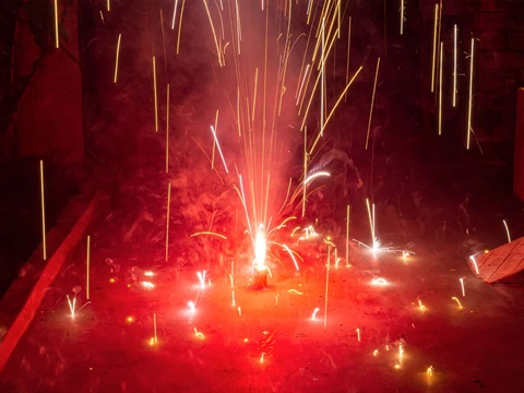 red-fireworks-sparking-on-the-ground