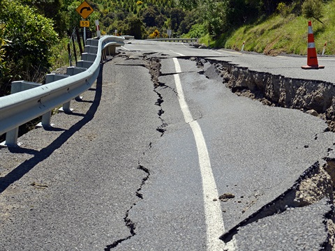 severe-earthquake-roadway-damage-cracks-and-orange-cones.jpg